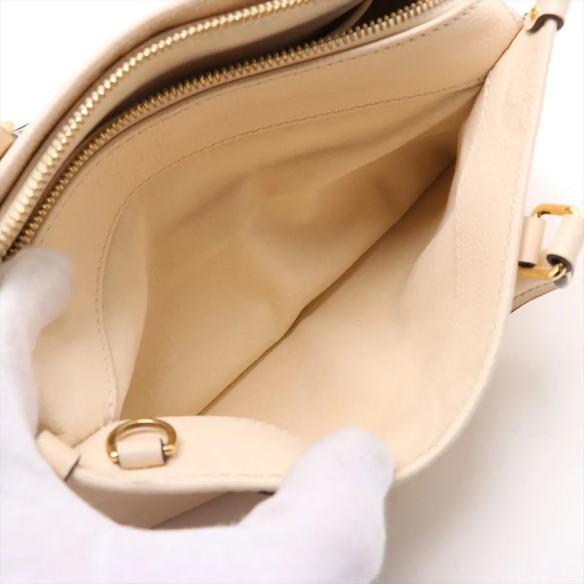 Louis Vuitton Monogram Empreinte OnTheGo East West Creme