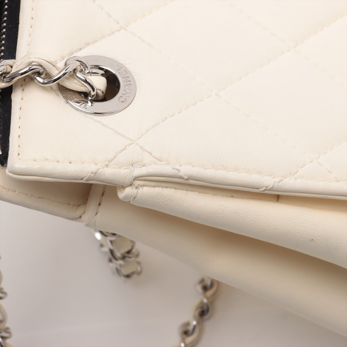 Chanel CC Logo Blizzard Matelasse Lambskin Chain Zip Top Flap Bag Black × White