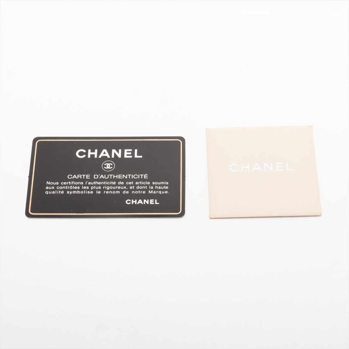 Chanel CC Logo Blizzard Matelasse Lambskin Chain Zip Top Flap Bag Black × White