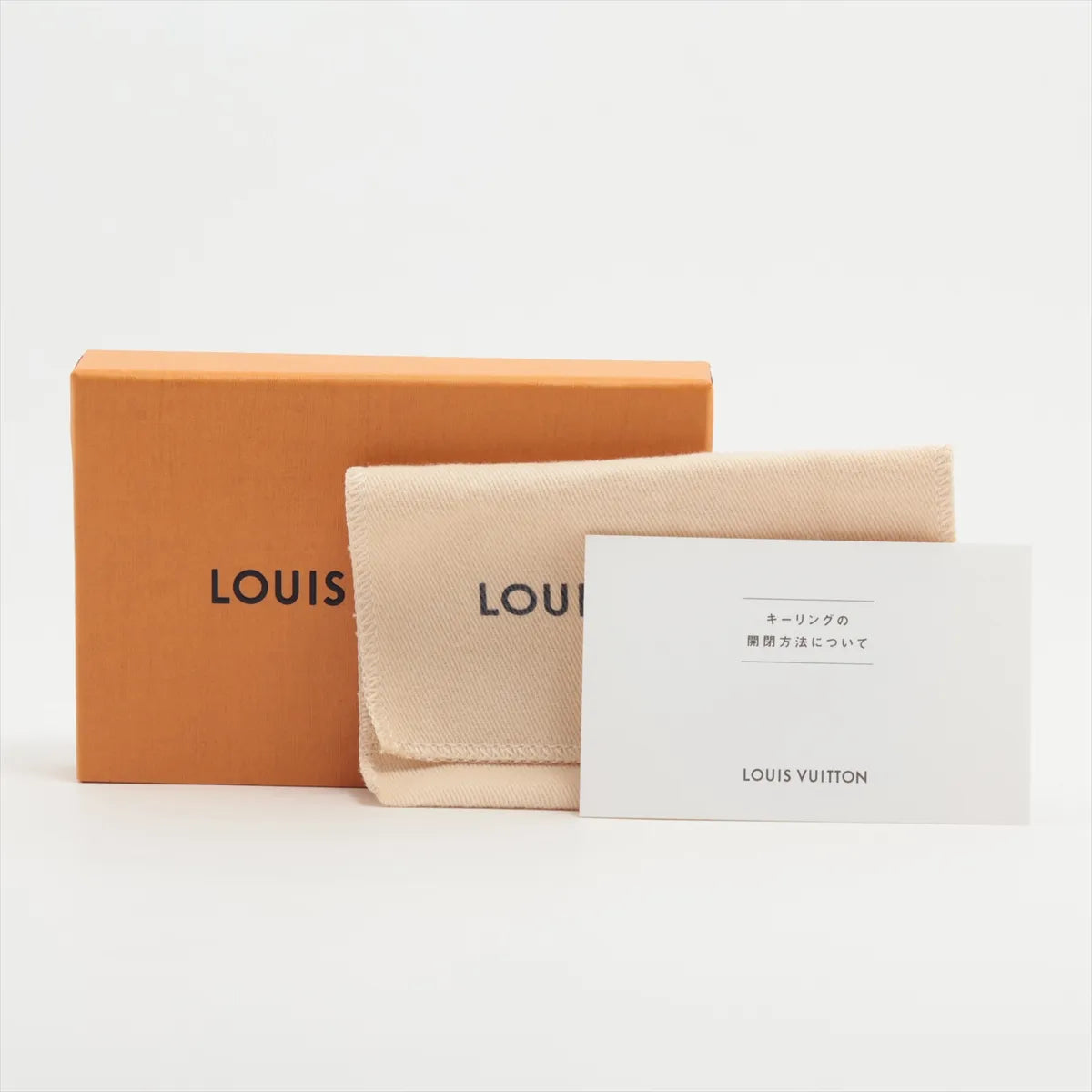 Louis Vuitton Round LV Logo Two-toned Bag Charm and Keyring