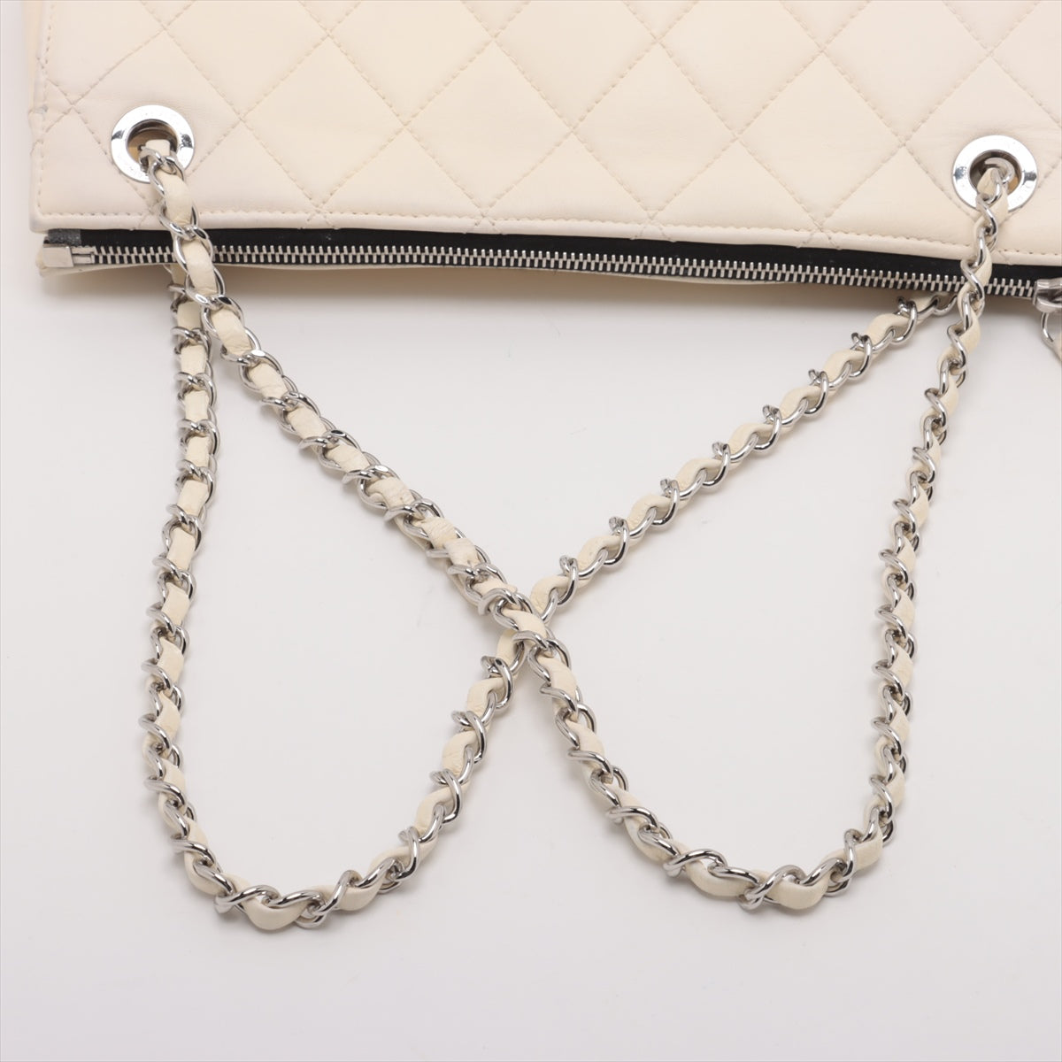 Chanel CC Logo Blizzard Matelasse Lambskin Chain Zip Top Flap Bag Black × White