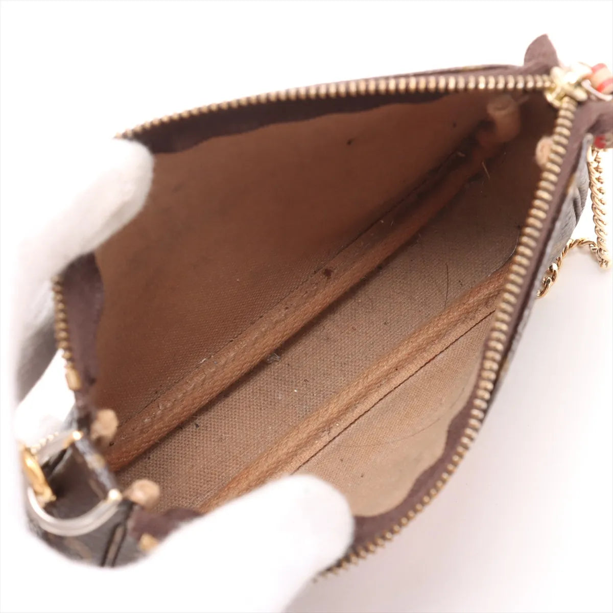 Louis Vuitton Monogram Trunk Patch Mini Pochette Accessoires