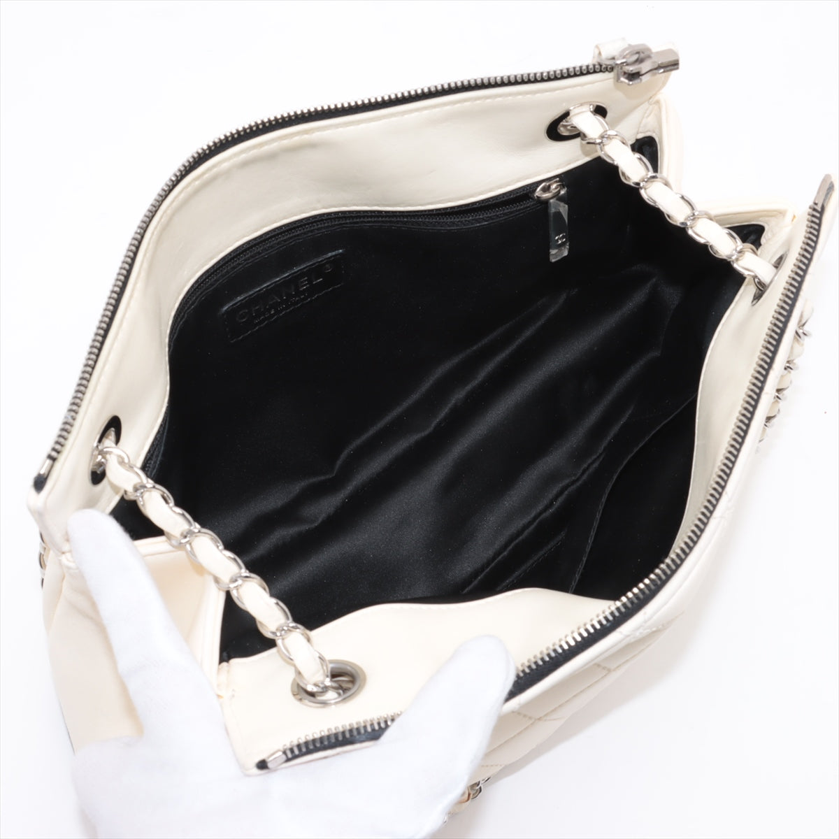Chanel CC Logo Blizzard Matelasse Lambskin Chain Zip Top Flap Bag Black × White