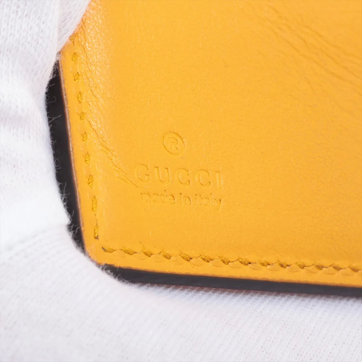 Gucci GG Logo Embossed Leather Compact Wallet Yellow