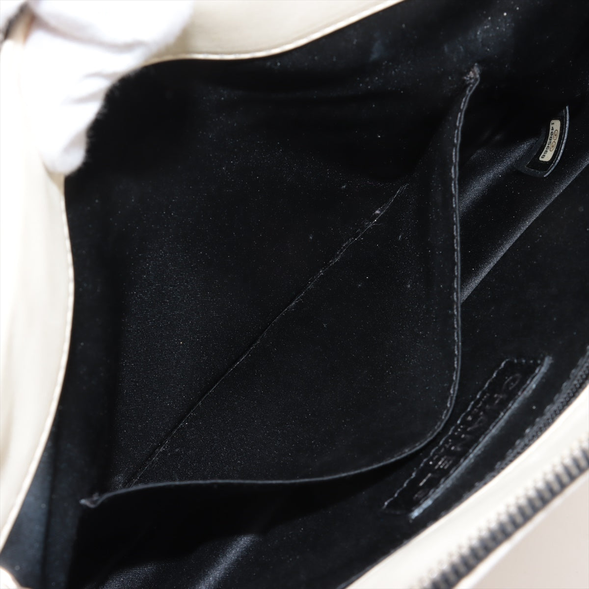Chanel CC Logo Blizzard Matelasse Lambskin Chain Zip Top Flap Bag Black × White