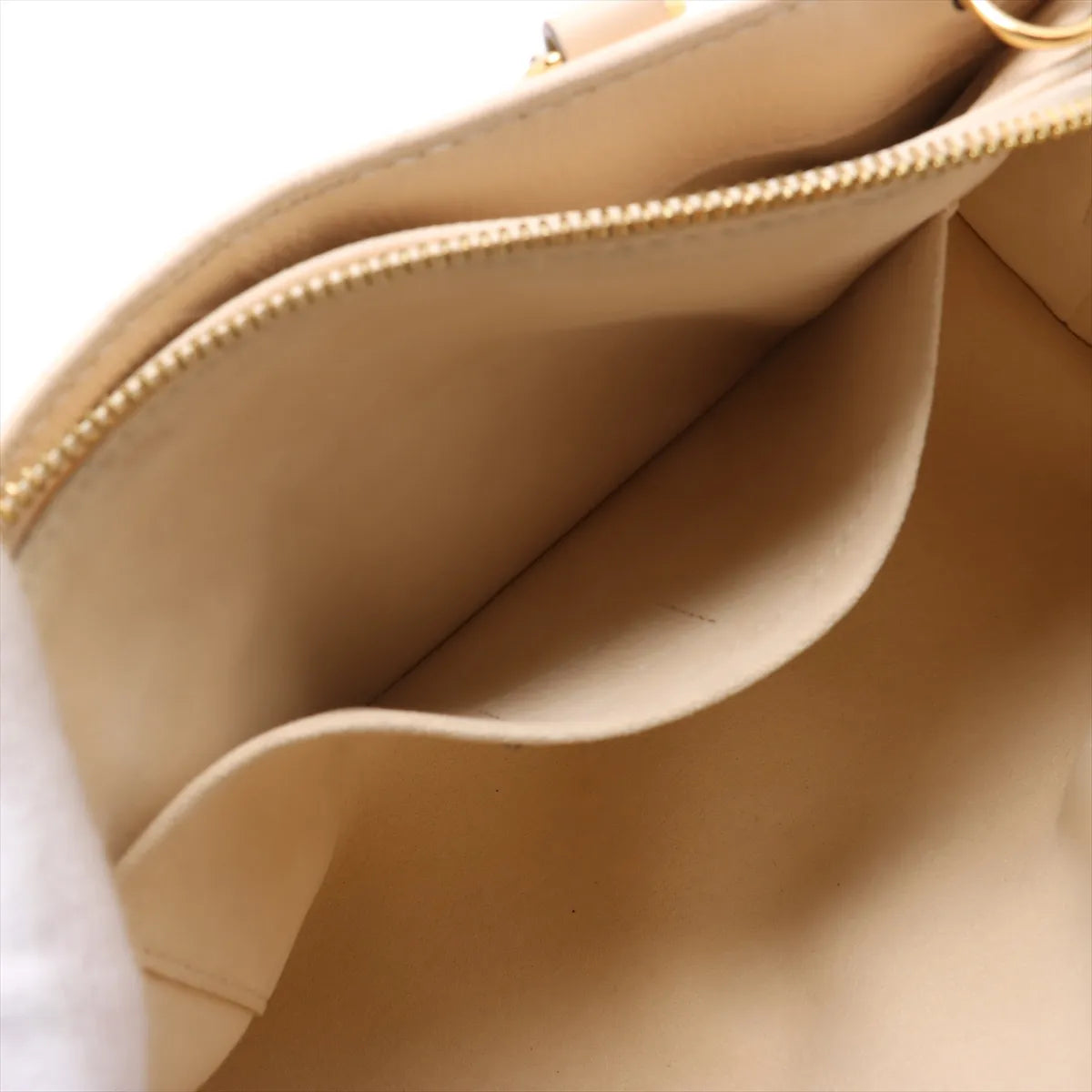 Louis Vuitton Monogram Empreinte OnTheGo East West Creme