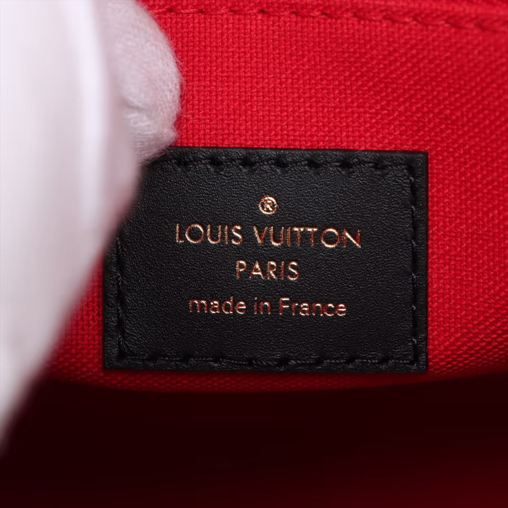 Louis Vuitton Monogram Giant Reverse On the Go PM