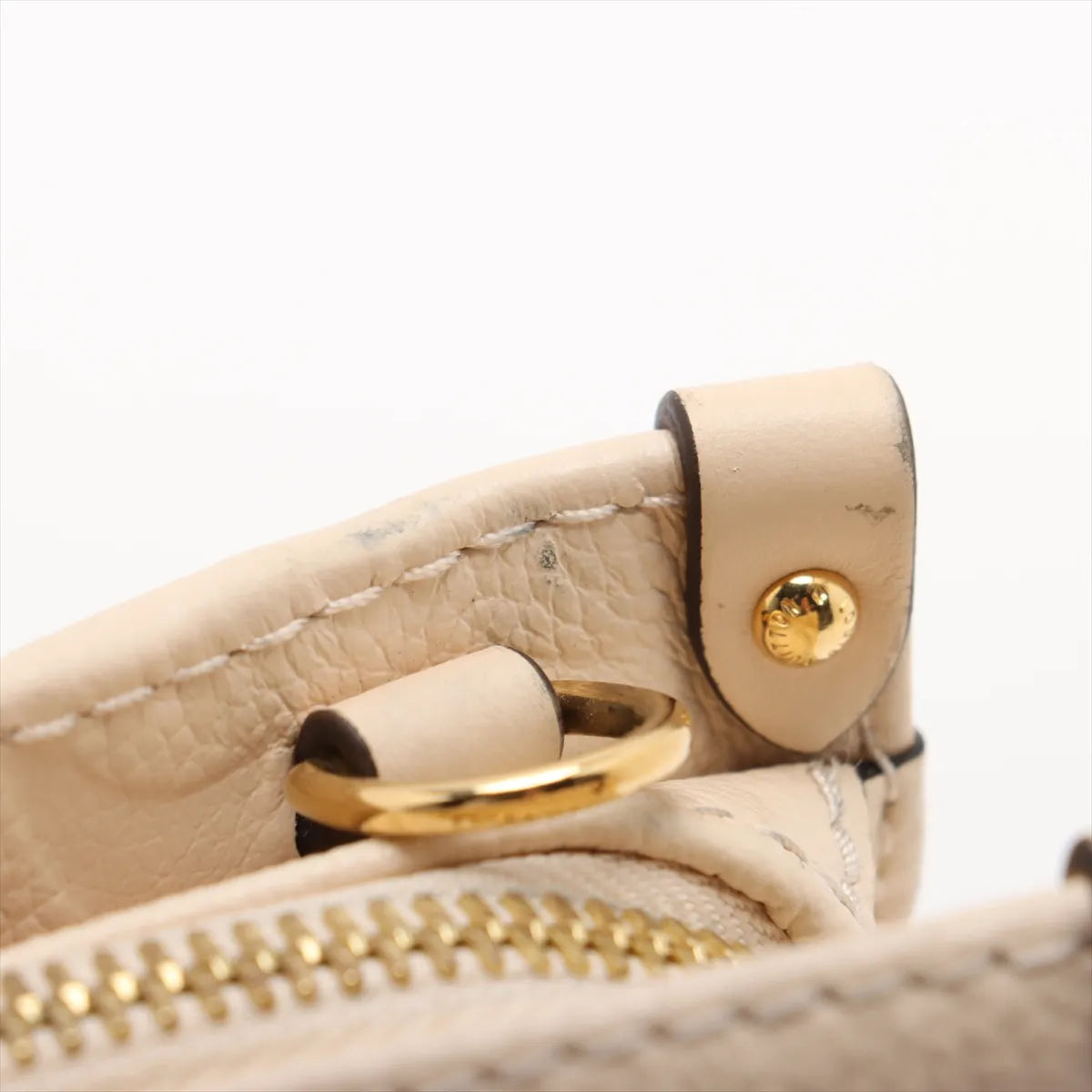 Louis Vuitton Monogram Empreinte OnTheGo East West Creme