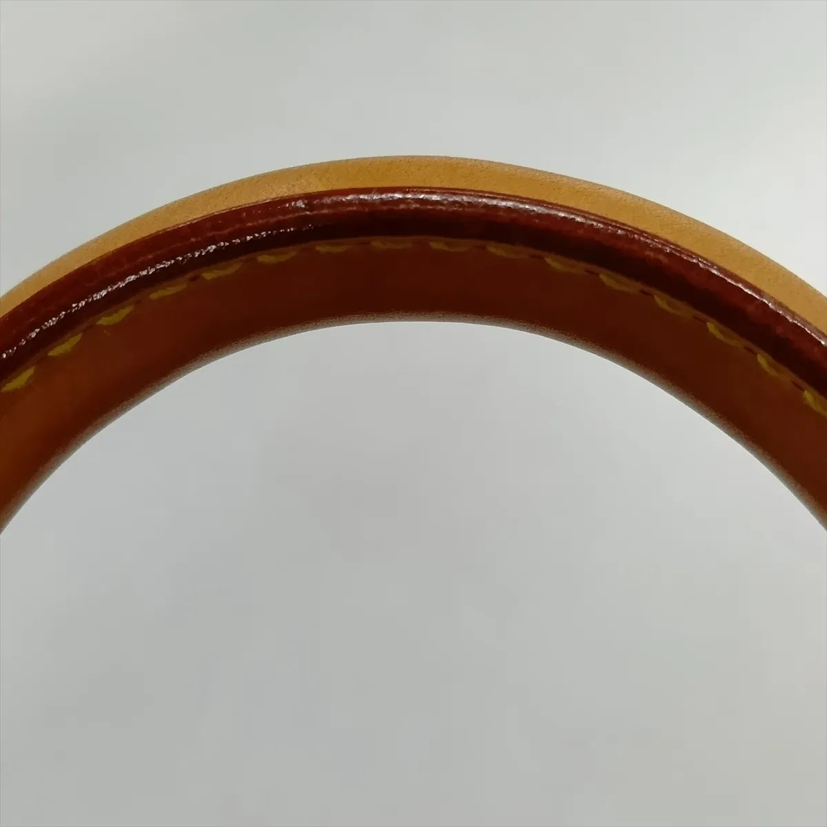 Louis Vuitton Monogram Alize 24H Brown