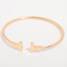 Load image into Gallery viewer, Tiffany &amp; Co. T Wire Bracelet Gold