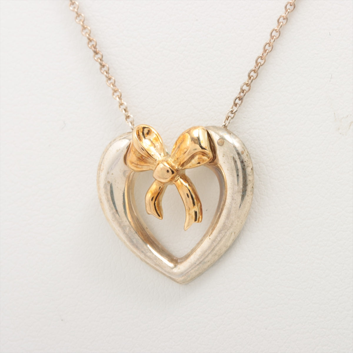 Tiffany & Co. Heart Bow Gold and Silver Necklace