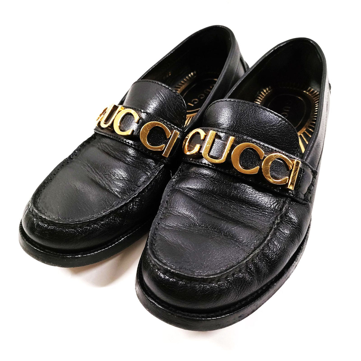 Gucci Black Leather Gold Logo Loafers — EU 37.5 — product view