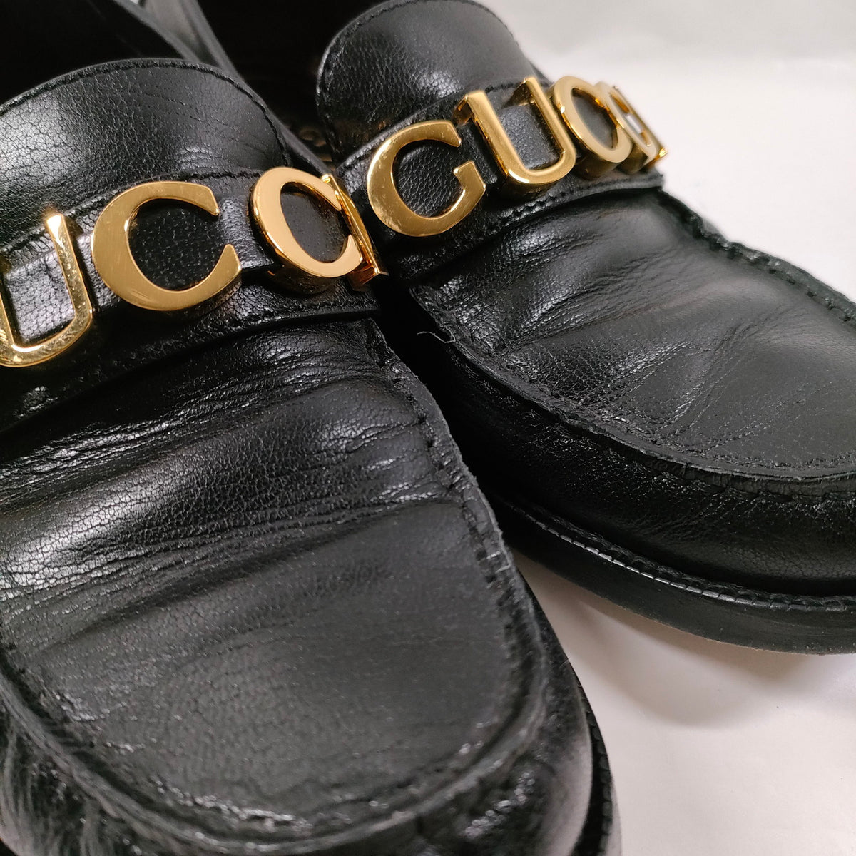 Gucci Black Leather Gold Logo Loafers — EU 37.5 — detail 8