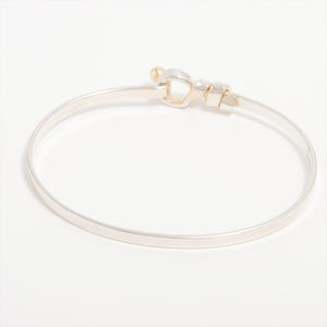 #1 Tiffany & Co. Love Knot Oval Hook and Eye Bangle    