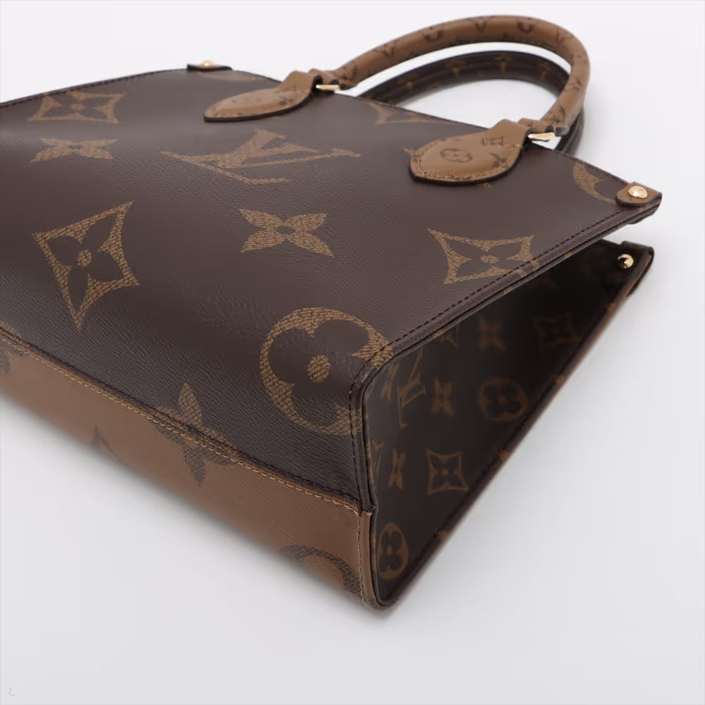 Louis Vuitton Monogram Giant Reverse On the Go PM