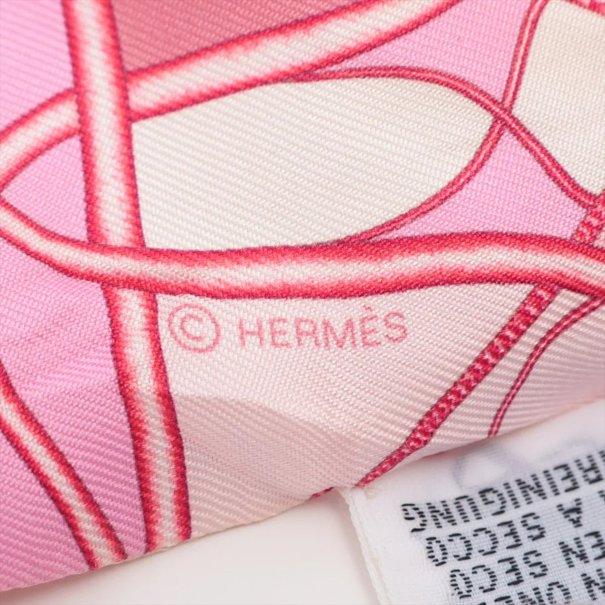 Hermes Twilly Coup de Fouet au Bloc Whip Silk Light Pink