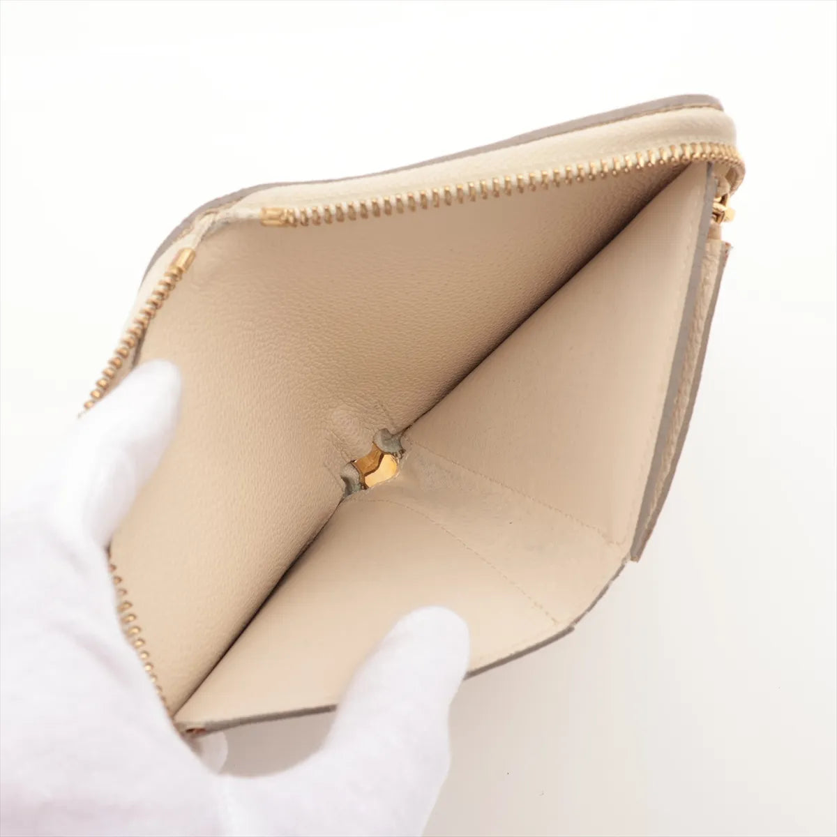 Louis Vuitton Empreinte Secret Zippy Wallet
