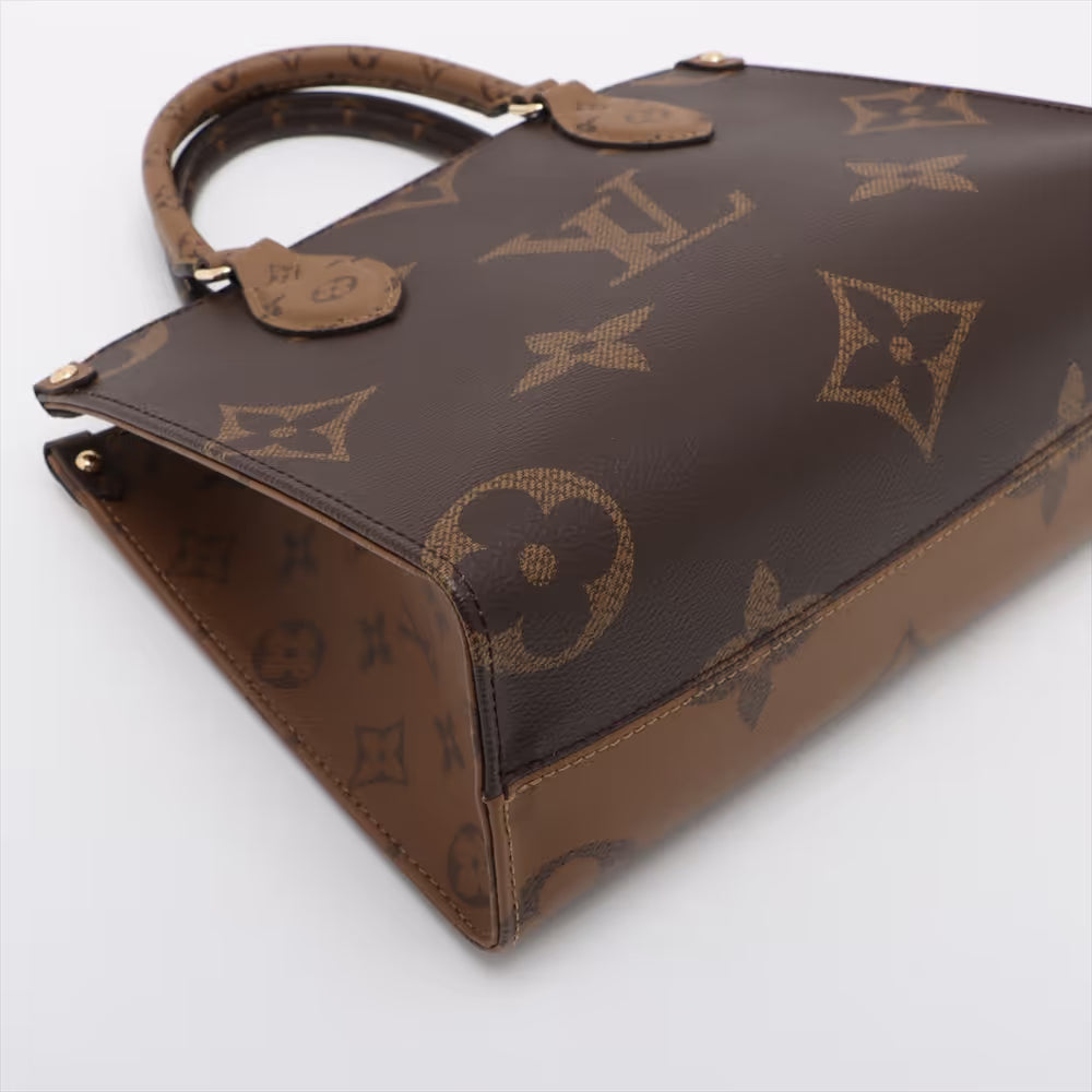 Louis Vuitton Monogram Giant Reverse On the Go PM