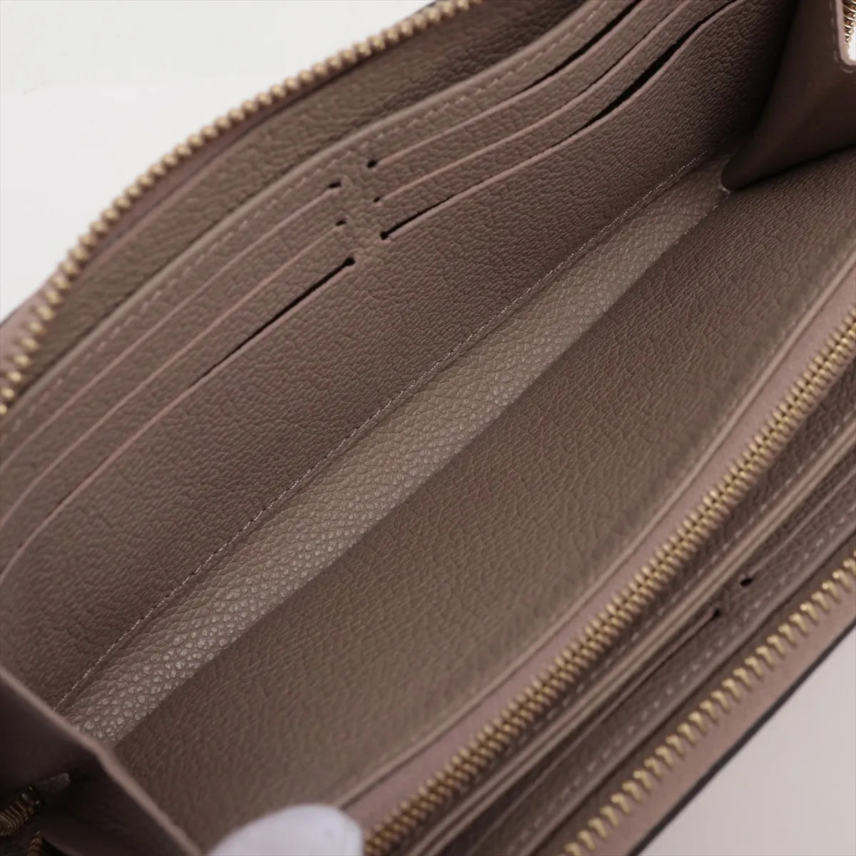 Louis Vuitton Bicolor Monogram Empreinte Zippy Wallet Tourterelle x Creme