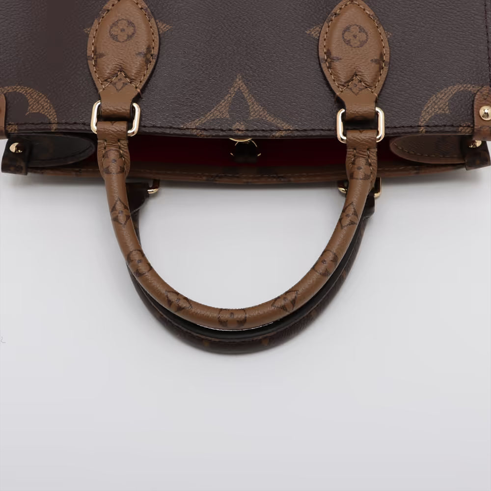 Louis Vuitton Monogram Giant Reverse On the Go PM