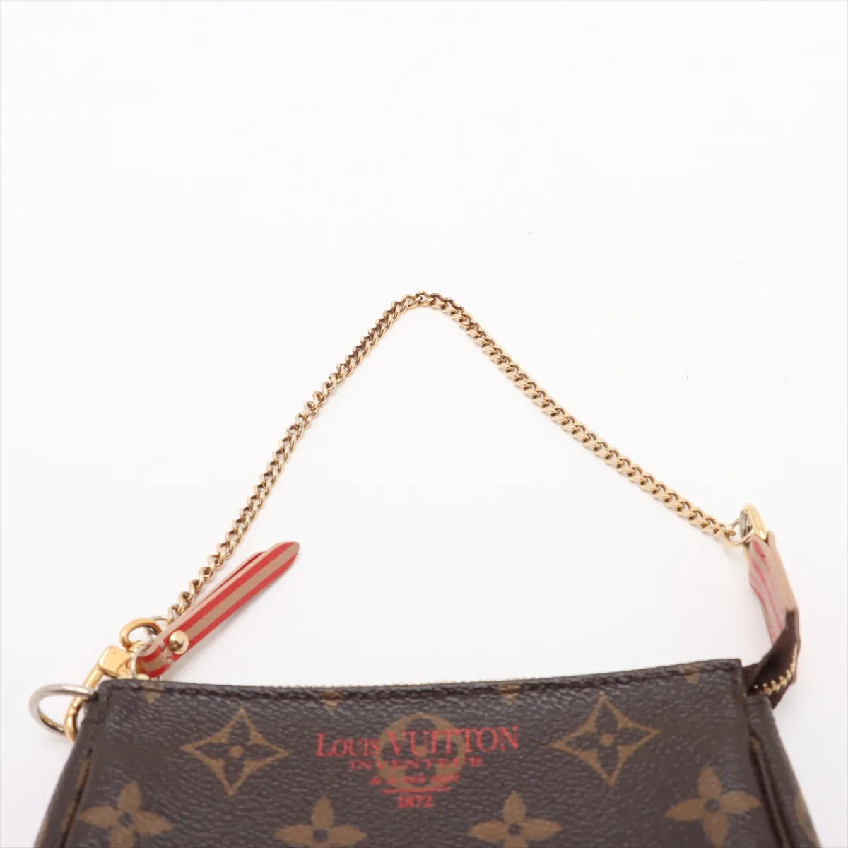 Louis Vuitton Monogram Trunk Patch Mini Pochette Accessoires