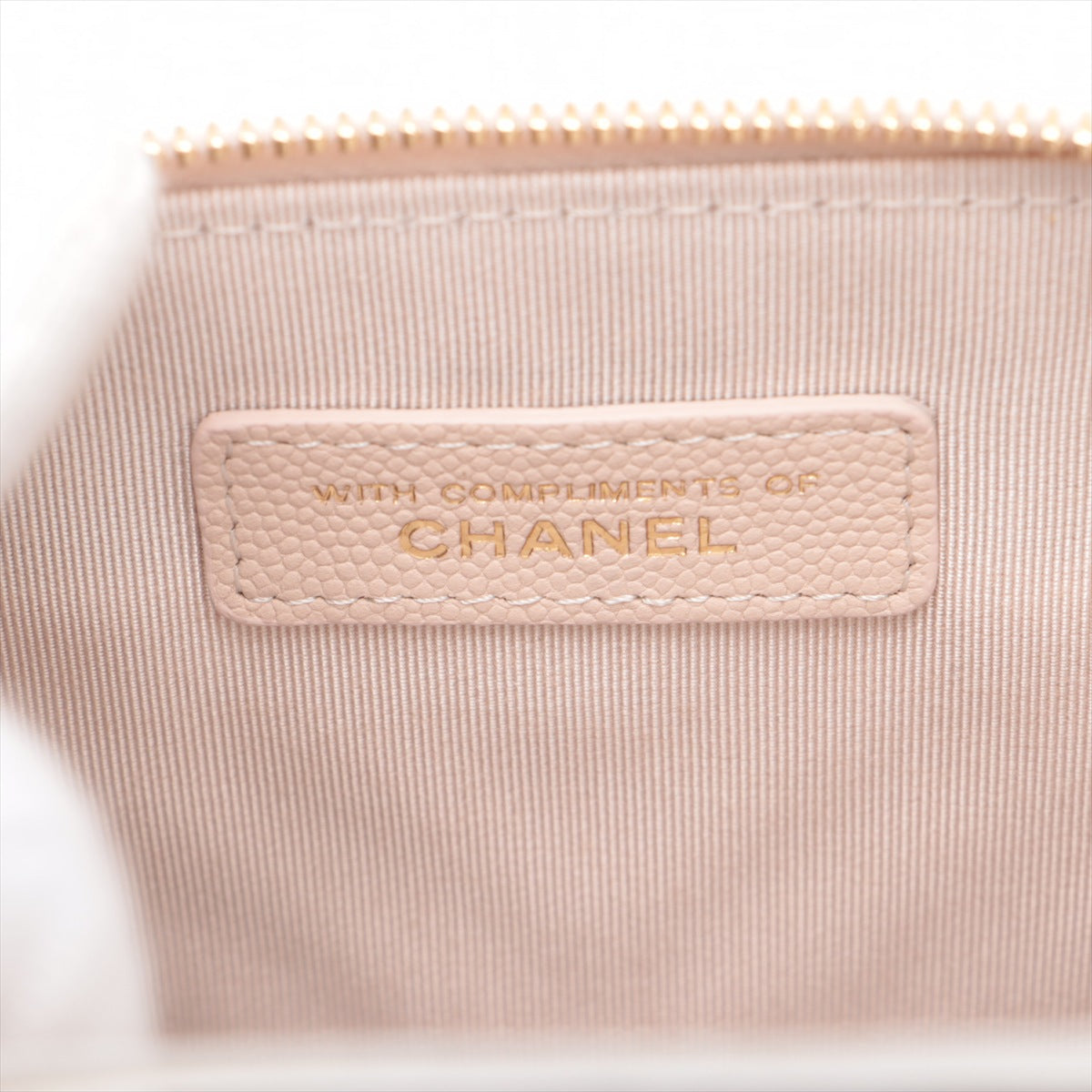 Chanel CC Logo V Stitch Caviar Skin Clutch Bag Beige