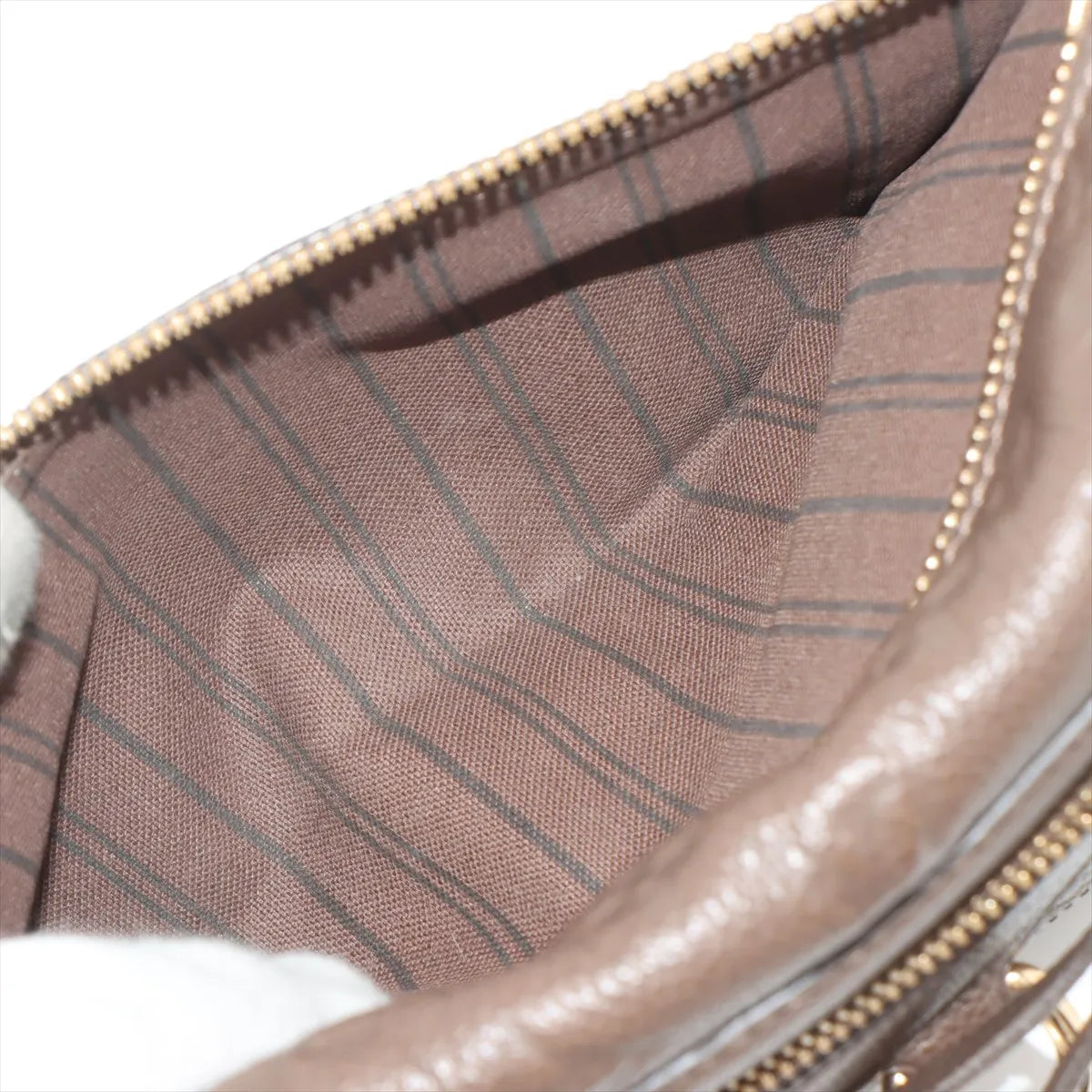 Louis Vuitton Monogram Empreinte Petillante Brown