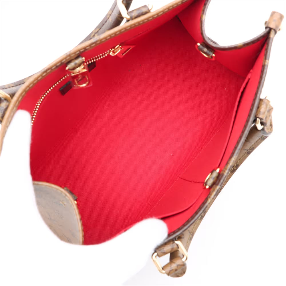 Louis Vuitton Monogram Giant Reverse On the Go PM