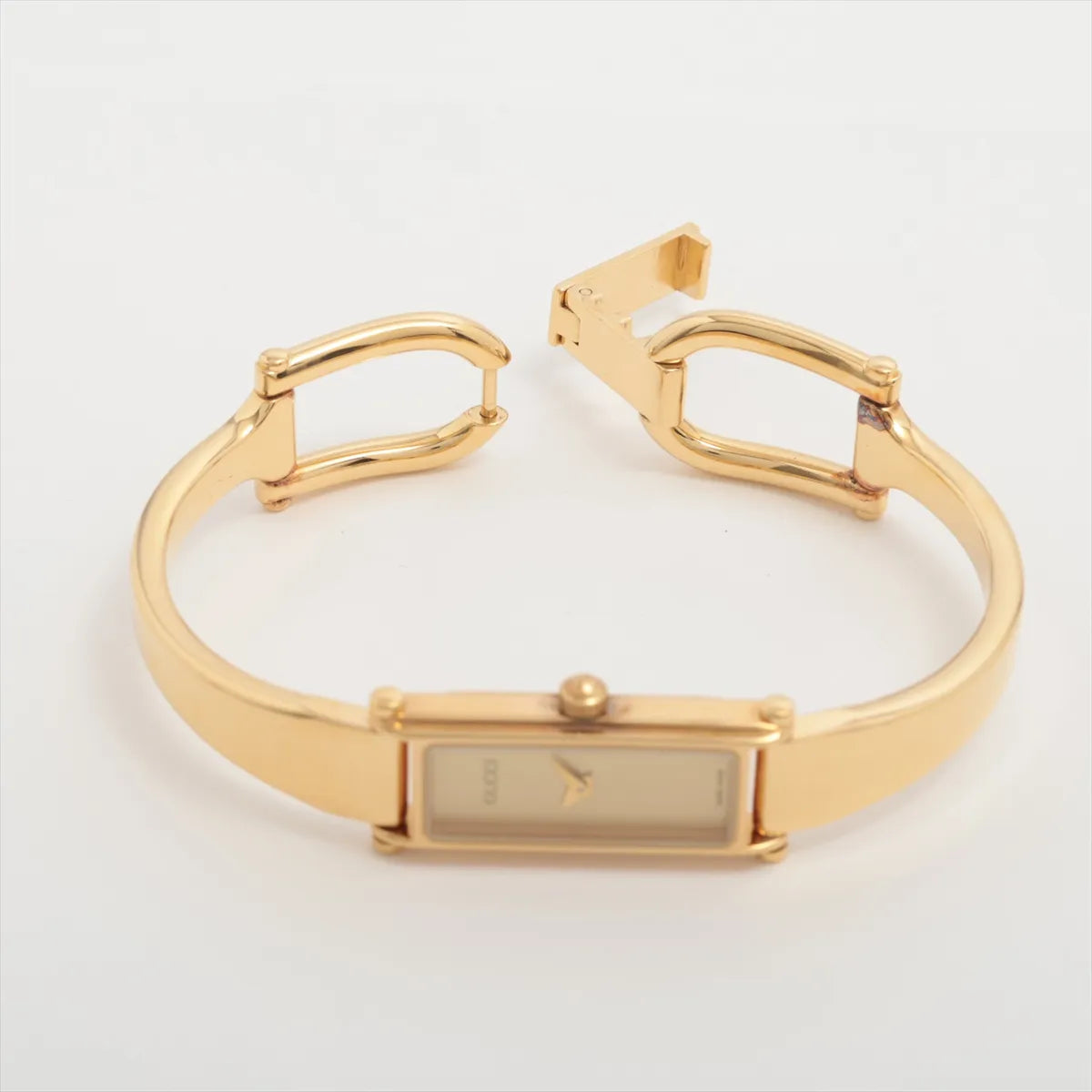 Gucci 1500L Bangle Quartz Watch — Gold Tone & Champagne Dial — actual item, additional view 5