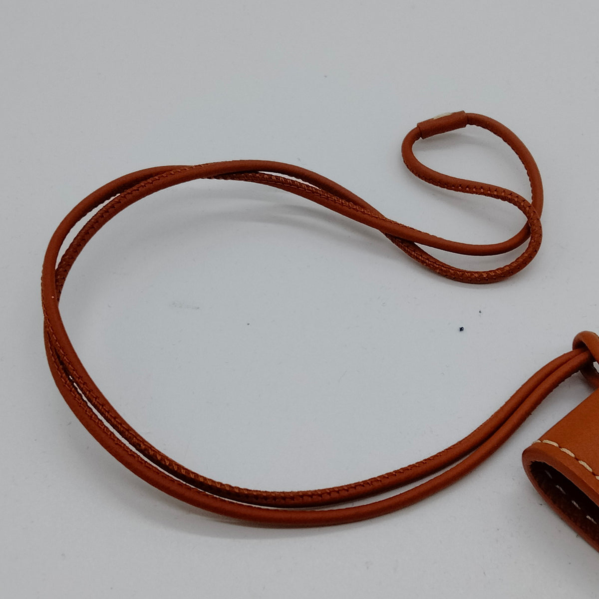 Goyard Tan Leather Clip Charm with Cord — original detail