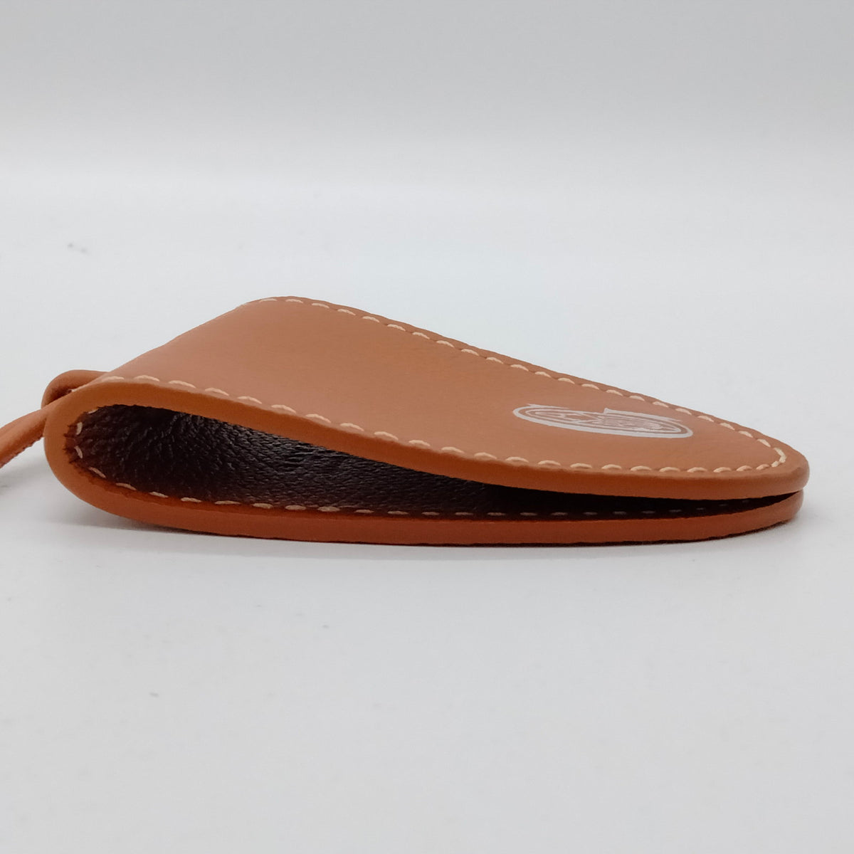 Goyard Tan Leather Clip Charm with Cord — original detail