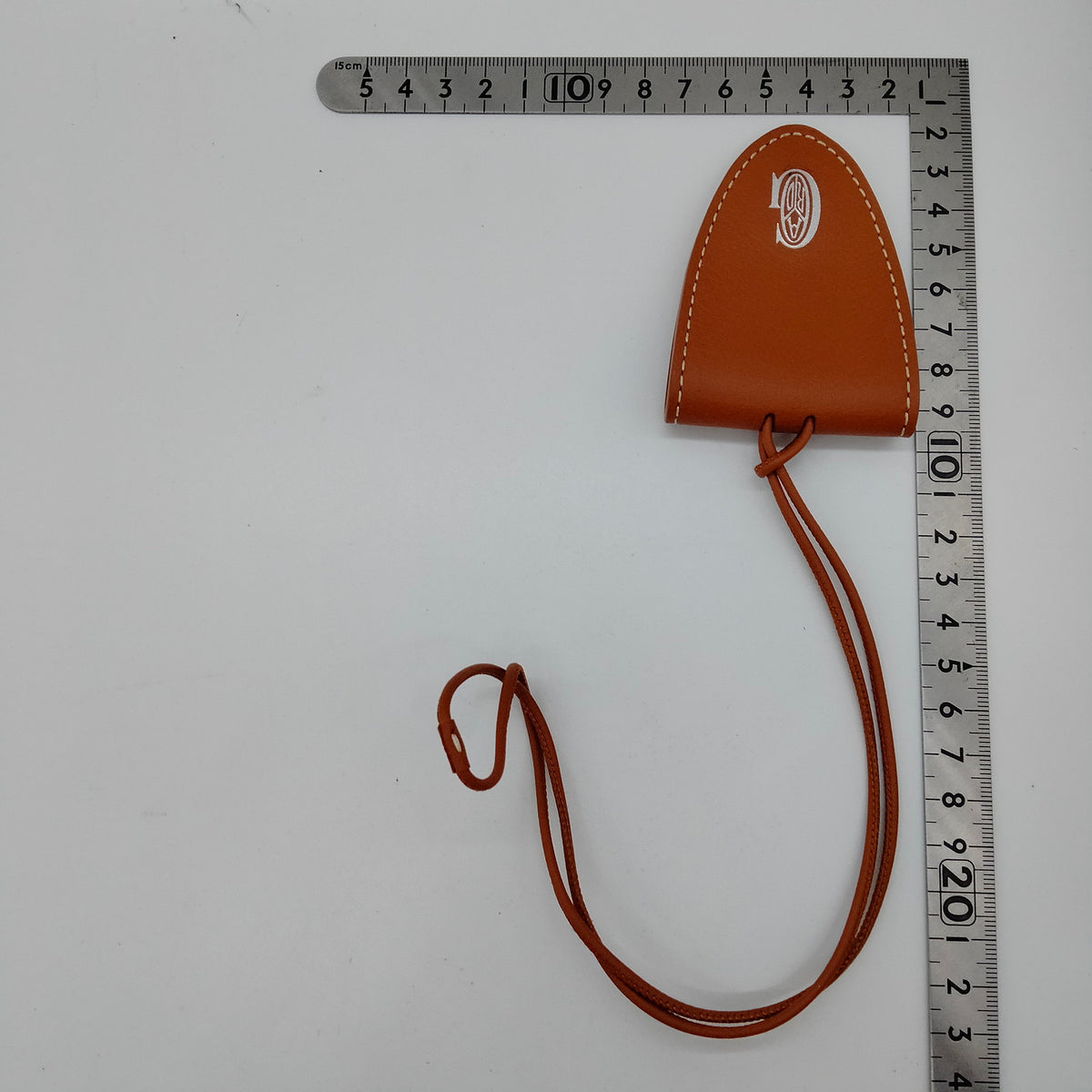 Goyard Tan Leather Clip Charm with Cord — original detail
