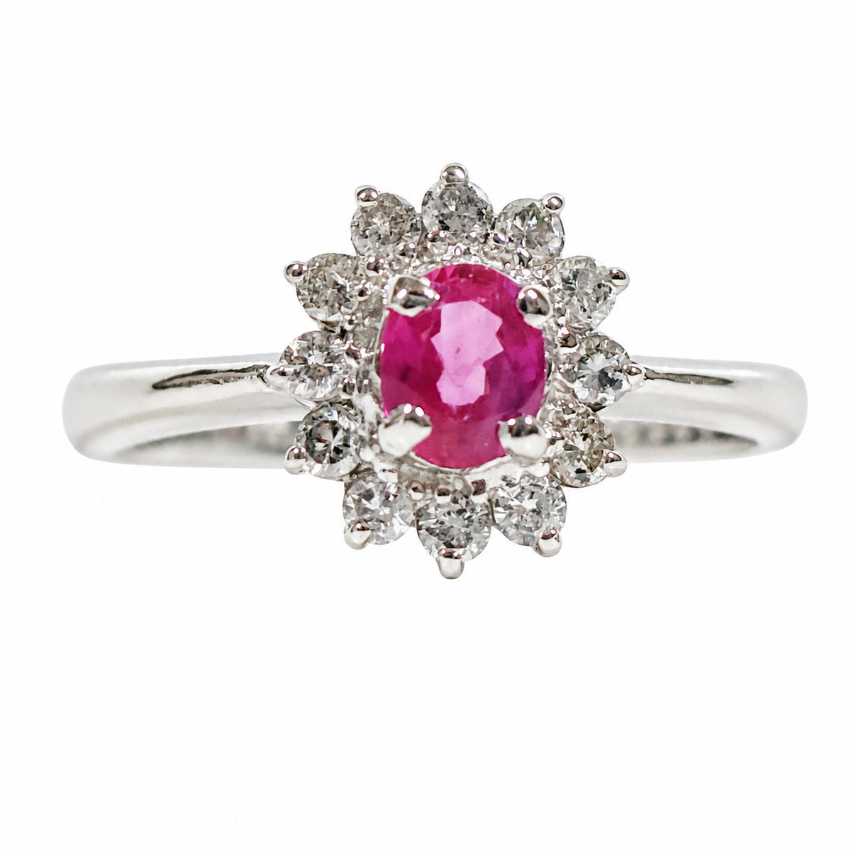 Pt900 Platinum 0.45 ct Ruby & Diamond Halo Ring on pure white background